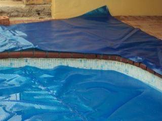 Step 5:Ensure that the pool cover remains evenly placed over the pool. 